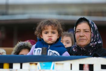 Families arriving at a reception centre in Ar-Raqqa city, Syria, on 4 December 2024