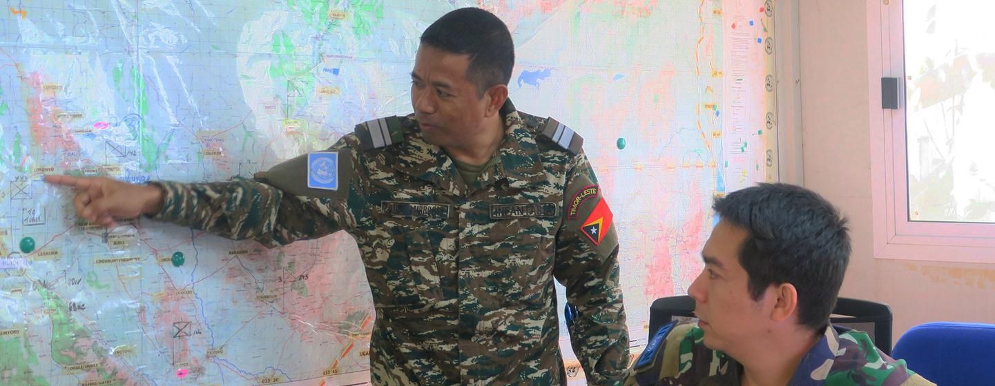 A peacekeeper from Timor-Leste (left) works alongside an Indonesian colleague at the UN peacekeeping mission in South Sudan.
