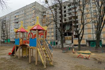 A children’s playground in front of a heavily damaged residential building in Kharkiv. (file)