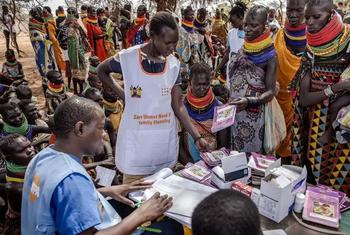 Health workers attend to pregnant and breastfeeding mothers at an outreach visit supported by UNFPA in Loima Sub-county.