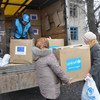 UNICEF distributes aid supplies to women in the village of Petrivske, Donetsk region, Ukraine. (February 2015)